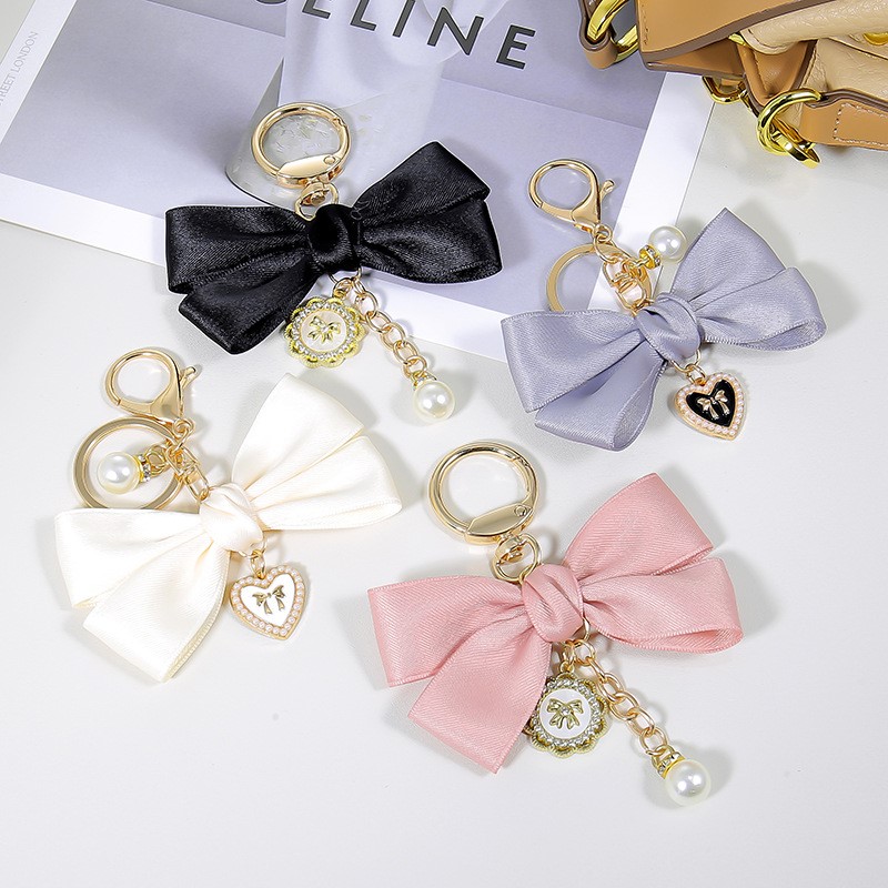 Phone Accessories Wholesale In China - Dameshanger Modieuze strikknoop sleutelhanger Telefoonhoesje Accessoire
