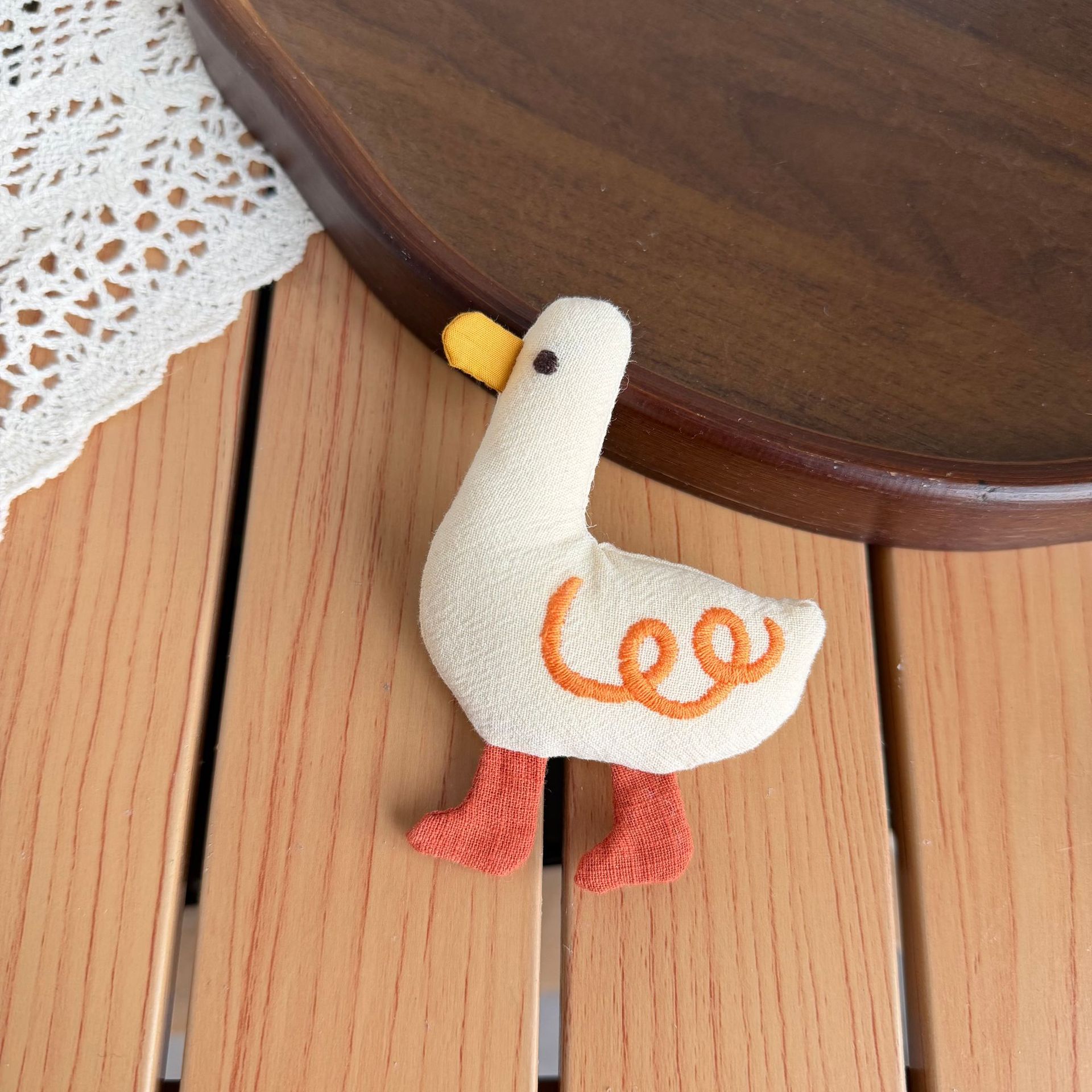 Gevulde stoffen eend poppenhan - Phone Accessories Doll recensie en prijs